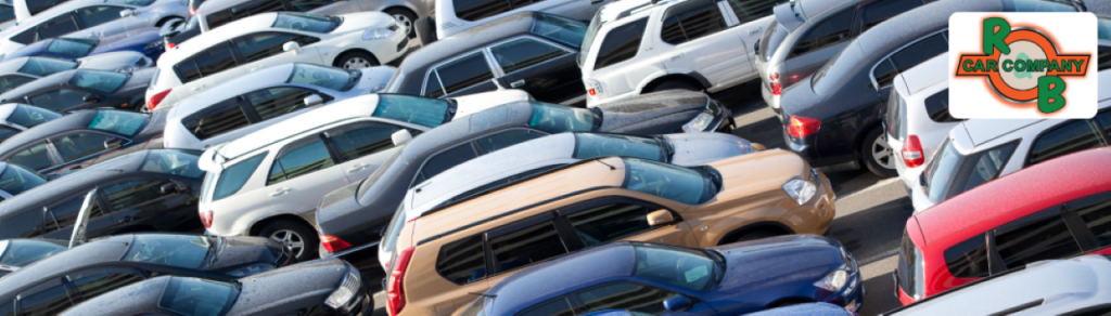 Vehicle appraiser from R&B Car Company Warsaw, evaluating a customer’s car for a Max Allowance trade-in.