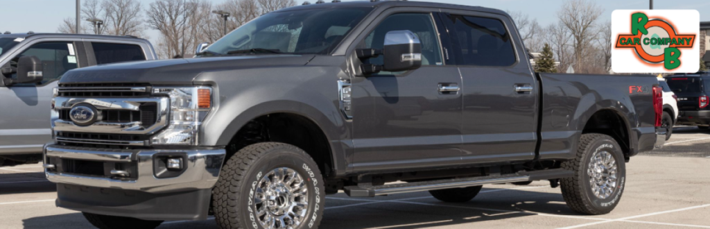 Customer reviewing financing options for a diesel truck at R&B Car Company Warsaw.