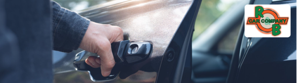 Mechanic at R&B Car Company Warsaw servicing a customer’s car in a clean and professional garage.
