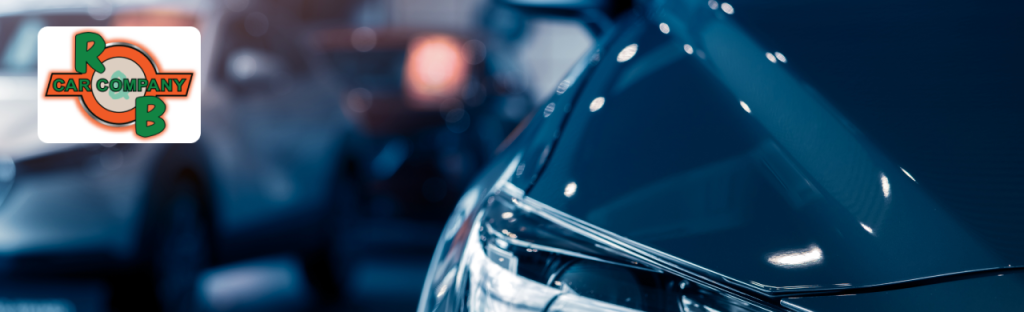 Budget-friendly used cars lined up at R&B Car Company Warsaw dealership lot.
