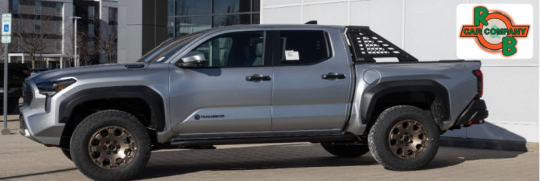 Used pickup trucks lined up on the R&B Car Company Warsaw lot, ready for sale in Warsaw, Indiana.