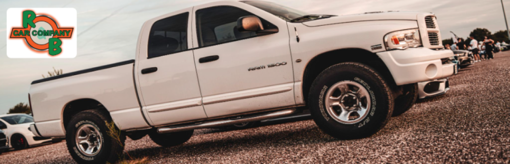  A lineup of used pickup trucks at R&B Car Company Warsaw, showcasing diverse makes and models available for sale.