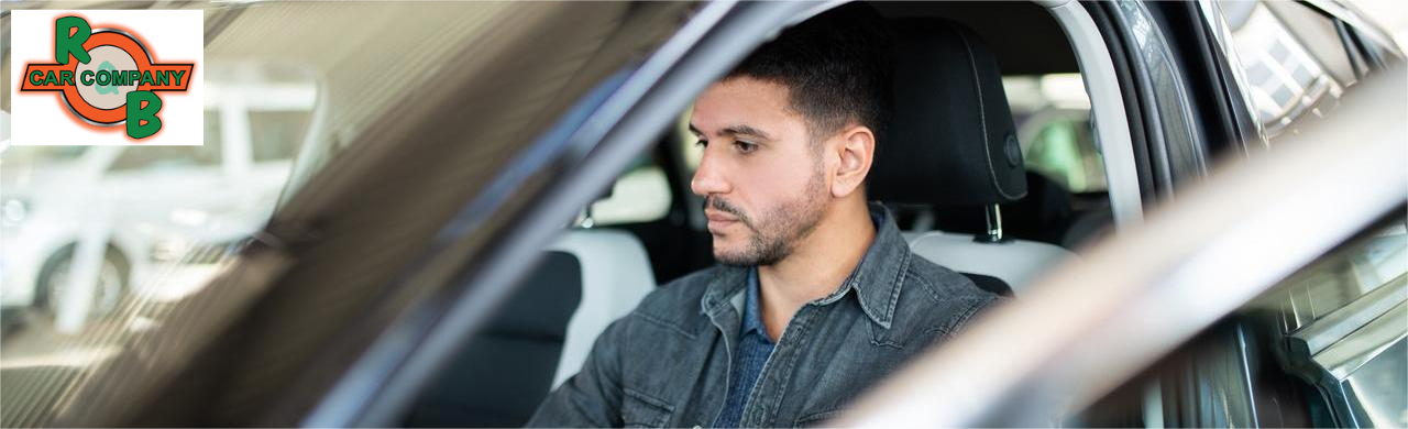 Budget used car inventory at the R&B Car Company Warsaw dealership lot.
